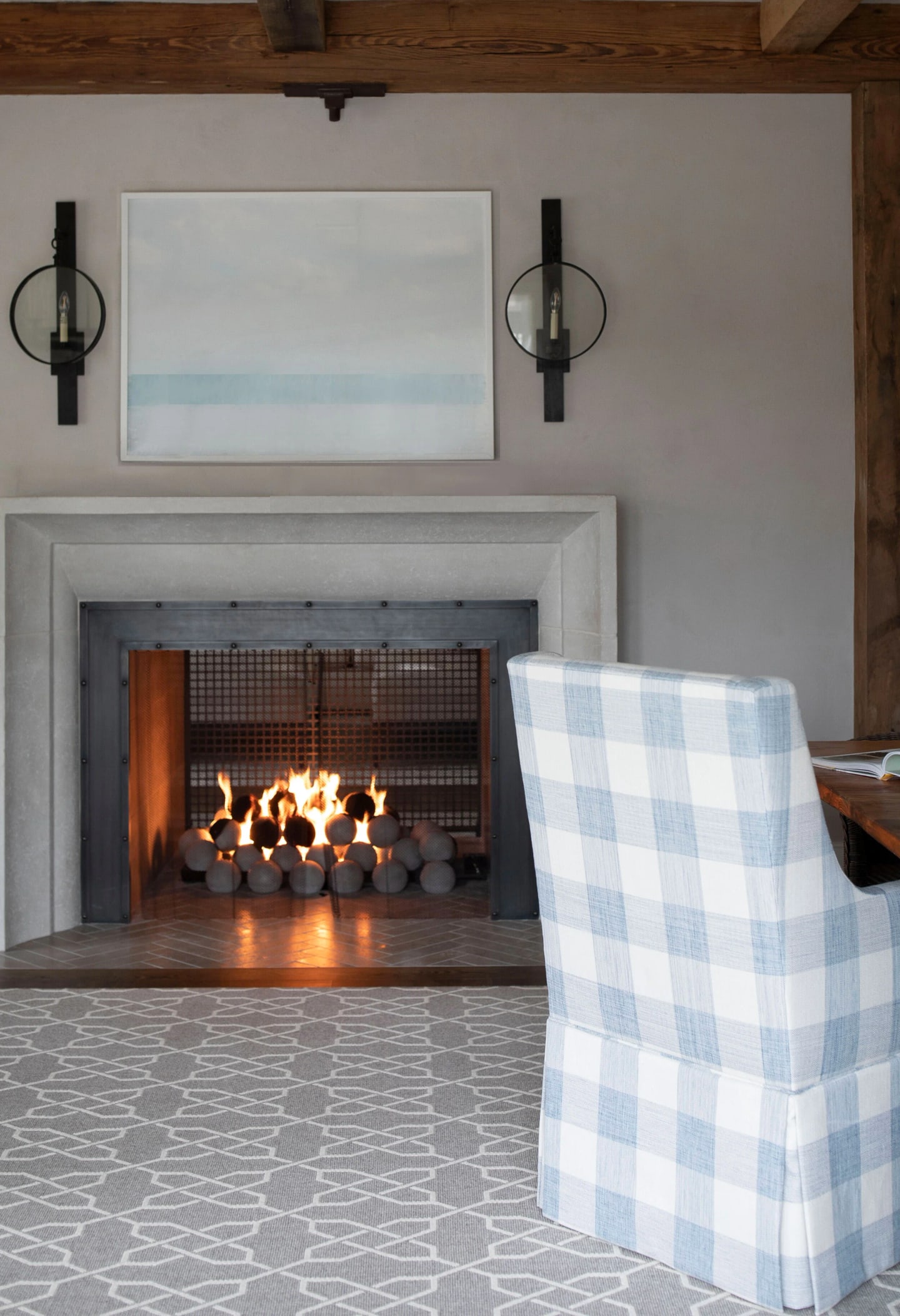 Custom metal surround and stone mantel on the living-room fireplace, Main Line Historic Barn